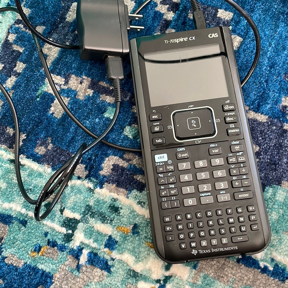 Ti-nspire CX CAS Texas Instruments Calculator with charging plug